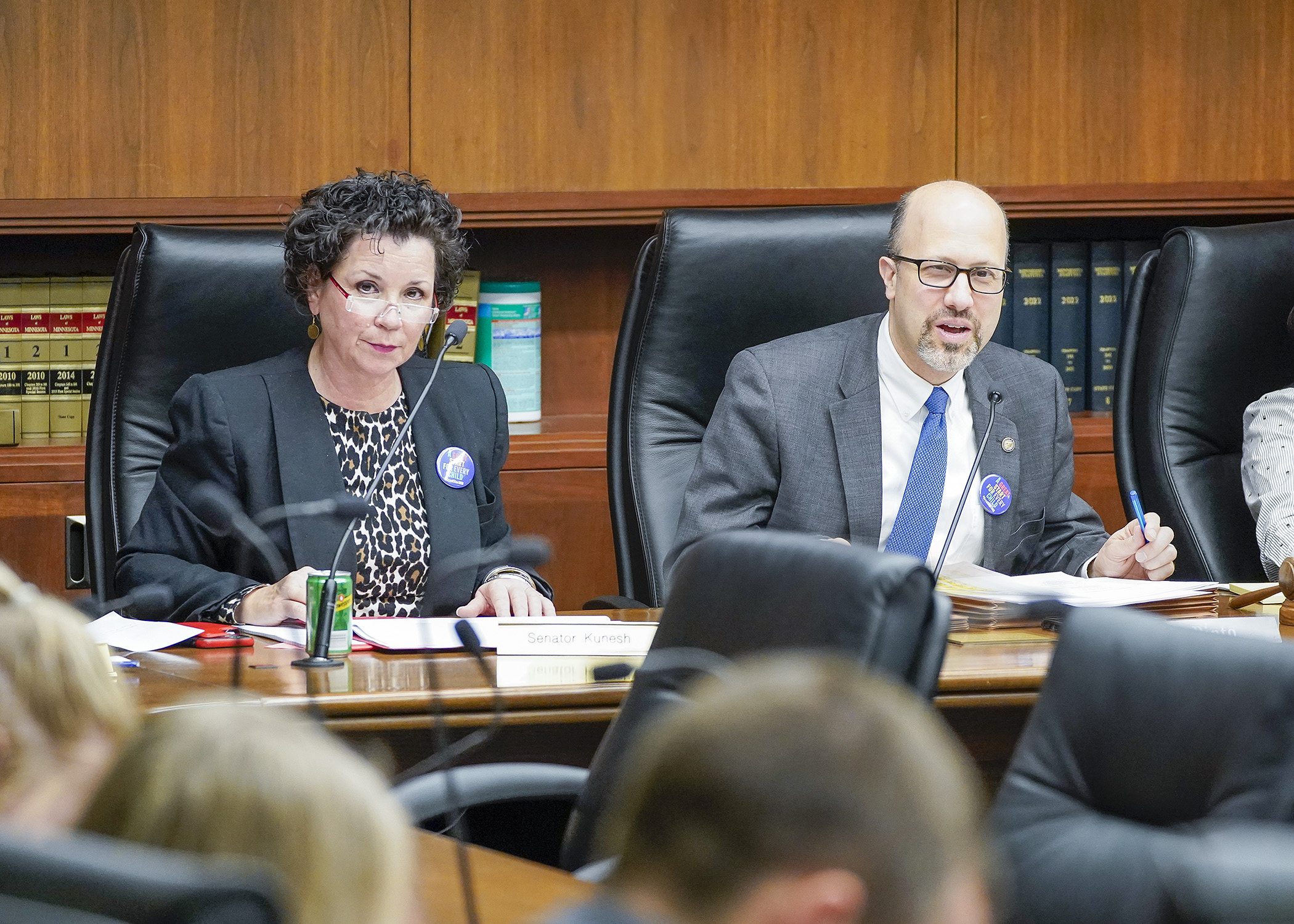 Rep. Dave Pinto and Sen. Mary Kunesh listen to conferee and staff introductions during the first meeting of the omnibus early education finance bill conference committee May 1. (Photo by Andrew VonBank)